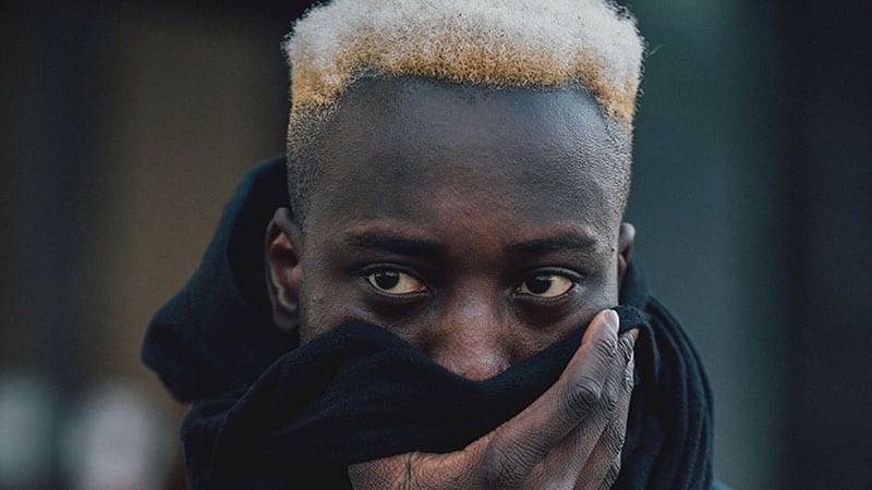 Blonde Curly Hair with Skin Fade